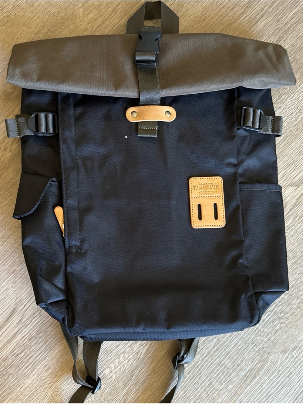 Black Roll-Top Backpack with Brown Leather Accents